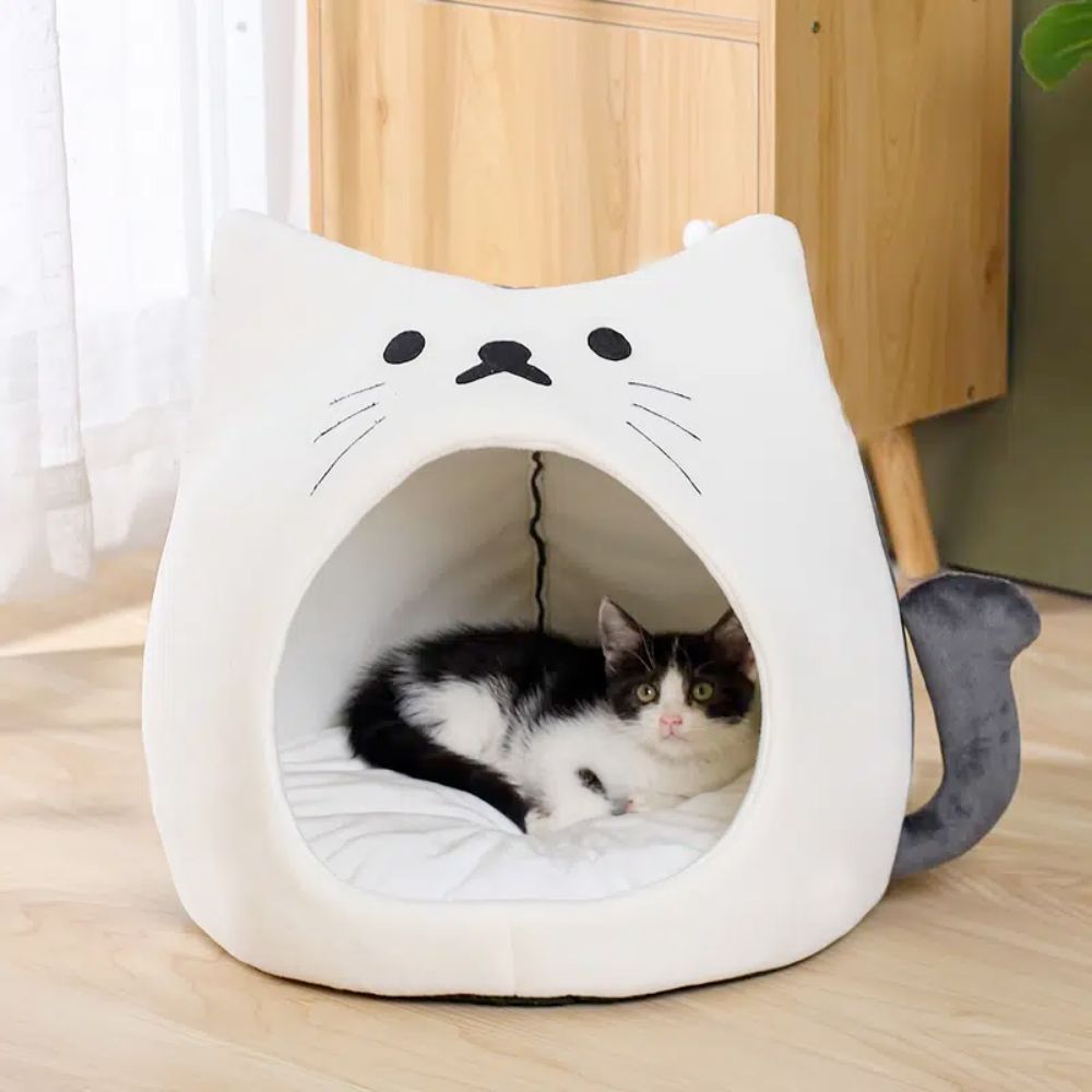 Adorable casa para mascotas con forma de gato