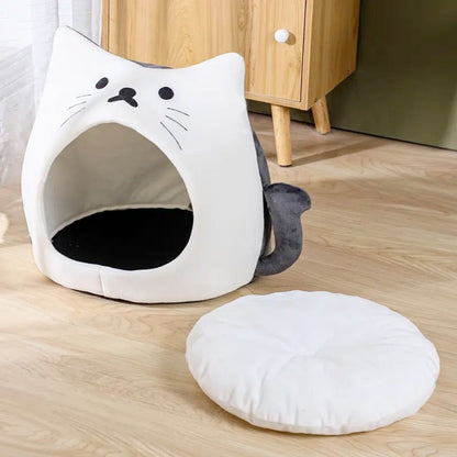 Adorable casa para mascotas con forma de gato